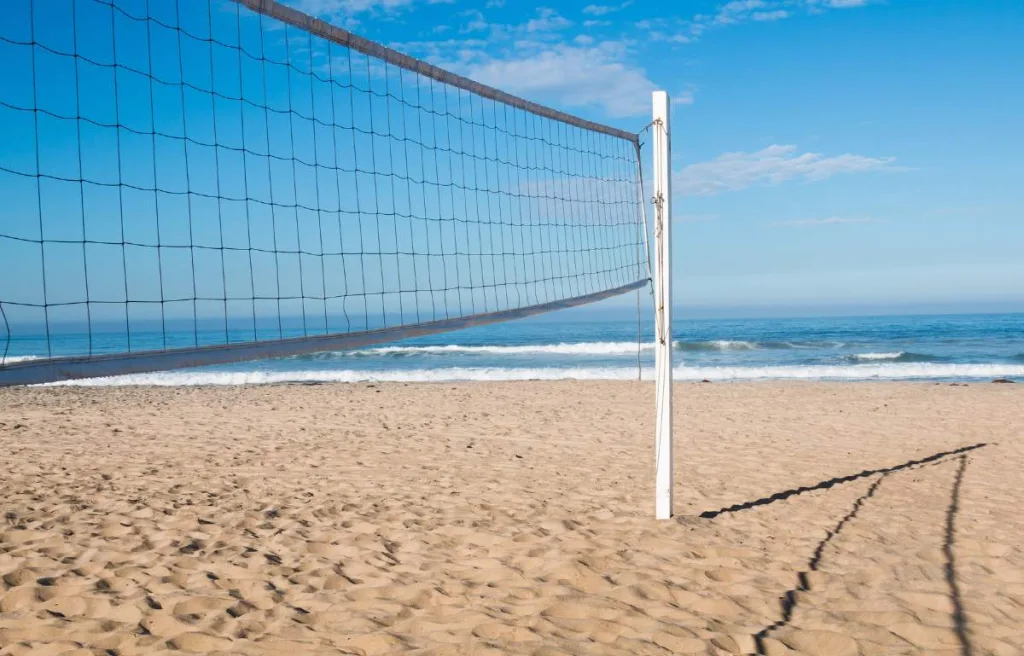 a beautiful picture of a beach volleyball net